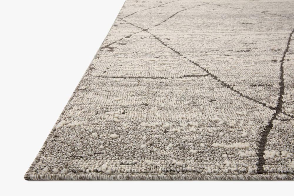Experience elegance with this charcoal colored rug, blending Moroccan motifs and a modern palette. Durable premium polyester, perfect for high-traffic areas.