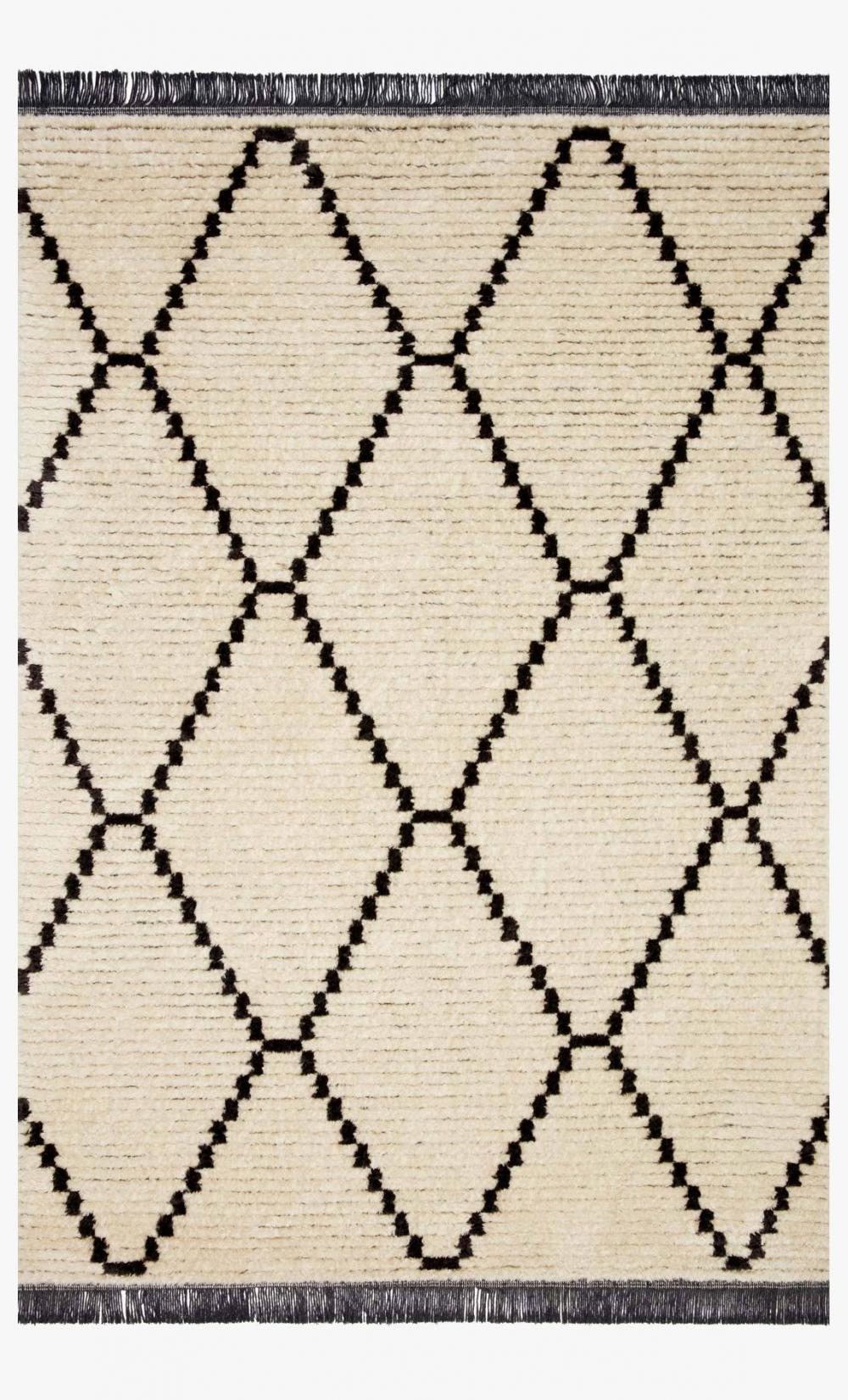 Creamy charcoal boho rug. Textured surface, diamond motifs, and lively fringe, transforming rooms into sanctuaries, Perfect for boho spaces