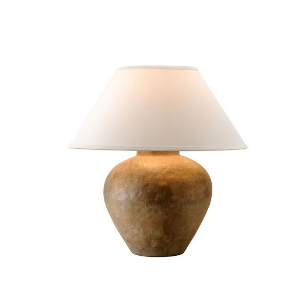 Add character and warmth to your space with the Calabria 1 Light Table Lamp in Sienna. Featuring earthy, aged textures and finishes, this lamp serves as a decorative accent while providing an essential layer of light. Perfect for enhancing any room with its unique allure.